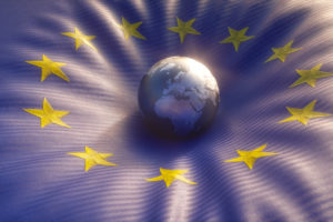 3d globe on EU flag; Blue with golden stars, EU legal compliance